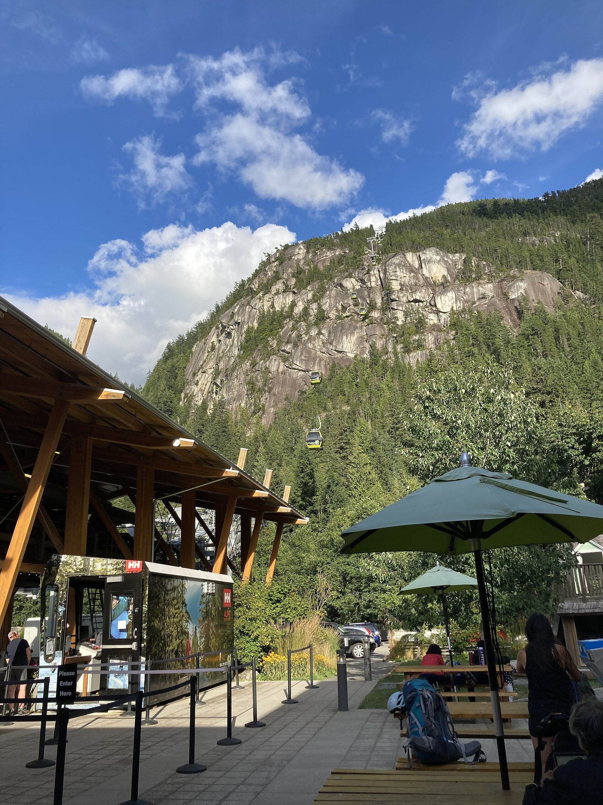 Gondola cabins climbing above Howe Sound